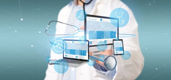 Healthcare provider stands behind floating monitors and screens mimicking the healthcare cloud 225817415