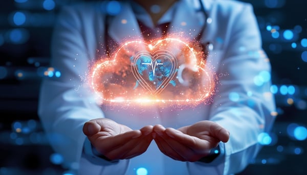Dr's hands hold a red cloud and a heart discussing the health of a practice's healthcare security 729092728